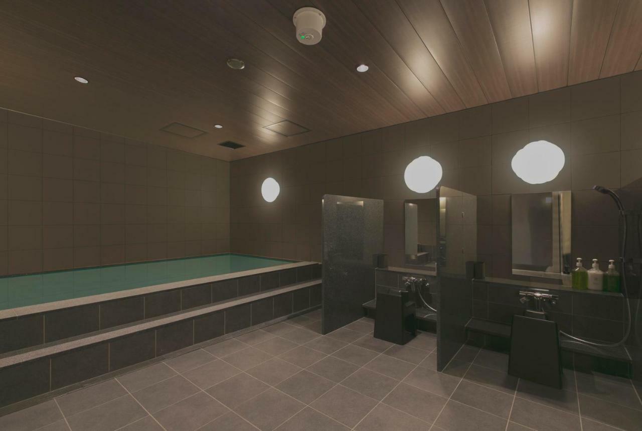 Отель First Cabin Tokyo Dome City Экстерьер фото